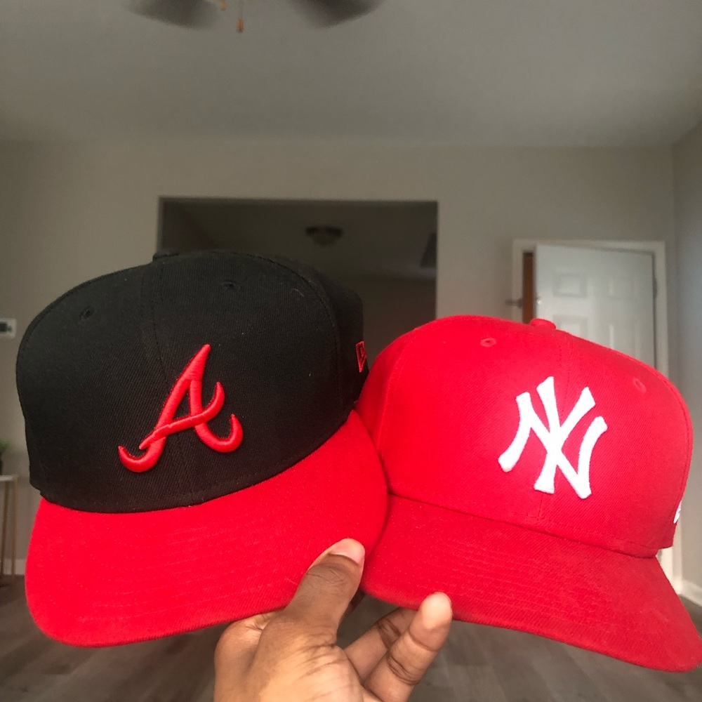 Red New York Yankee hat
& Black and Red Atlanta Braves hat
